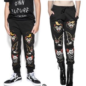 EUC SZ SMALL red and black joggers